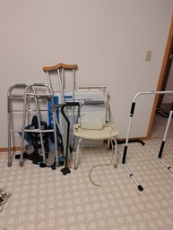 Rm.5. Walker, Baby Gate, Walking Stick, Crutches, Shower Seat, Bed Assist Handle.