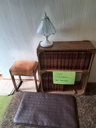 Rm.6. Bookshelf, Touch Lamp, Cushioned Stool And Floor Mat.