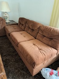 Rm.6. Sectional Sofa Bed And Pillows.