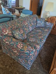Rm.6. Floral Sofa Bed With Pillows
