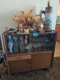 Rm.6. Small Cabinet With Glass Face.