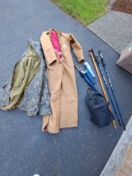 Rm. 0. Carhartt Coveralls, Camo Rain Jacket, Umbrellas, Backpack And Walking Sticks