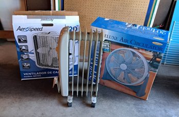 Rm. 0. Two 20 Inch Box Fans And Pelonis Electric Heater.