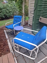 Rm. 00. Outdoor Lounge Chairs With Cushion And Small Table.
