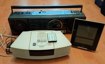 Rm.2. Bose Wave Radio/CD Player, Realistic CD-3300 Player And Accurate Weather Station