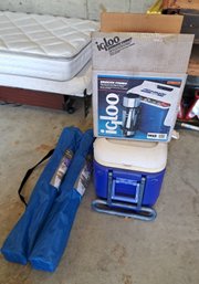 Rm.0. Two Igloo Coolers And Two Folding Camping Chairs