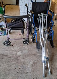 R00 Wheelchair, Walker With Wheels, Two Set Of Crutches And Arm Sling