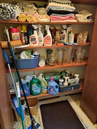 R8 Assorted Household Cleaners, Mops, Garbage Cans, Rugs And Towels.