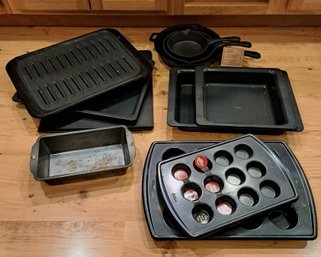 R2 Assortment Of Baking Ware, Three Piece Skillet Set And Large/small Muffin Tins.