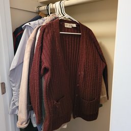 R2 Closet Full Of Sweaters And Jackets With Stainless Steel Trash Can