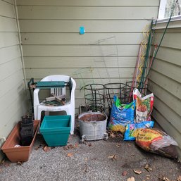 R0 Assorted Gardening Lot Includes Metal Pale Wheeled Planter, Garden Pots, Tomato Trellis, Stakes And Others