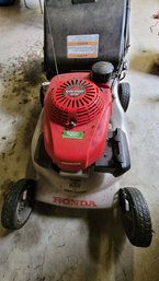 R0 Honda Smart Drive Lawn Mower With Twin Blades And Easy Start