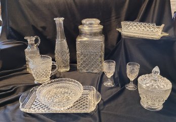 *r1 Assorted Glassware Including Candy Dishes, Cracked Butter Dish, Vase, Pitcher, Serving Tray, And 5 Drinkin