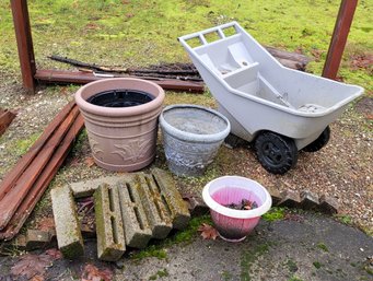 R00 Rubbermaid Plastic Wheelbarrow, 3 Plastic Pots Of Various Sizes, Cement Border Pavers