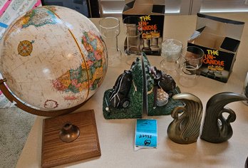 R1 Disconnected Globe, Two Book Holders, And Candle Holders
