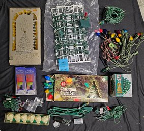 R7 Lot To Include A Variety Of Christmas Lights, Extention Cord, And Replacement Bulbs