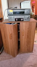 R2 Tv Cabinet, Zenith VHS Player, RCA VHS Player, And 4 Boxes Full Of Dvds And VHS Tapes
