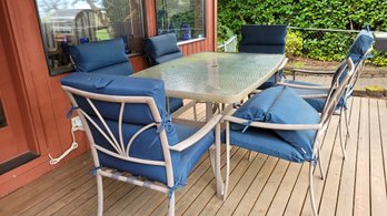 R00 Metal And Glass Outdoor Table And 6 Captain's Chairs With Cushions