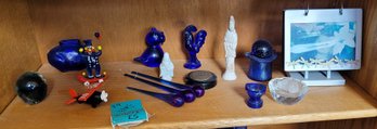 R4 Assorted Blue Glass Items, Asian Inspired Figurines, Metal Photo Album, And Other Items