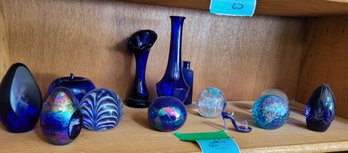 R4 Collection Of Blue Glass Paper Weights In Varying Shades Of Blue, Vases, And Other Items