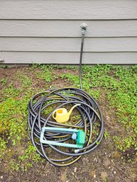 R00 Hose, Sprinkler, And Watering Can