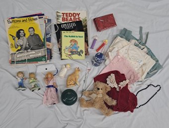 Antique Baby Clothes, Vintage Sheet Music, Ginger Jar,Carved Cinnabar Box, Pez Dispensers,  Small Teddy Bear