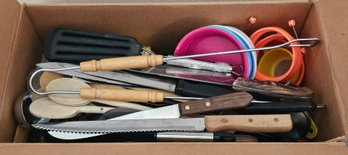 R3 Contents Of Box To Include Kitchen Utensils Such As Knives, Measuring Cups, Can Openers, Peelers, And More