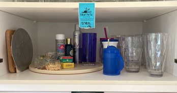 Plastic Cups, Trivets, And Miscellaneous Kitchen Items