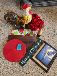 Placemats, Large Ceramic Rooster, Artificial Flowers In Mirrored Vase, Decorative Sign, Two Framed Prints
