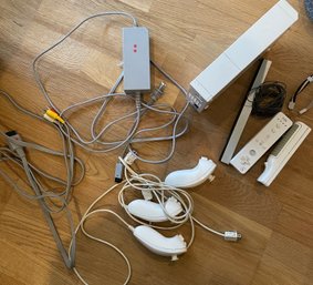 Nintendo Wii, Sensor Bar, Three Joysticks, Powercord, And  AV Cord