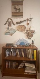 Bookcase With Books And Magazines, Clock, Various Cultural Wall Art