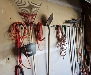 R0 Wall Full Of Garden Supplies And Some Items On The Ground