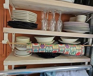 R6 Two Shelves Full Of Dishware, Champaign Glasses,  And Two Wrapping Paper Rolls