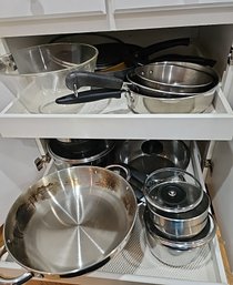 R10 Two Cabinets Full Of Pots, Pans, And Glass Bowl