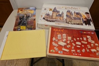 R1 Unopened Hogwarts 3D Puzzle, Harry Potter Figurine, Used Note Pad, And Additional 3D Puzzle