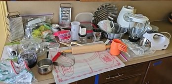 R3 Two Shelves Full Of Baking Utensils, Oster Blender And Handheld Mixer, Cheese Graters And More