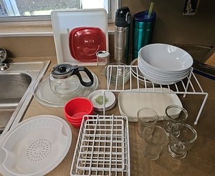 R3 Two Cabinets Full Of Plastic Lids And Containers, Glassware, Ceramic Bowls, Metal Risers, And More