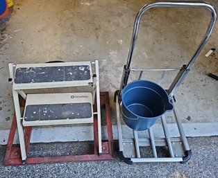 R0 Two Metal Carts, A Step Ladder, And A Plastic 9-quart Bucket