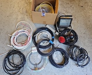 R0 Variety Of Cords Including Cables, Steel Coils, One Light, And Power Strip