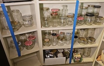 R3 Multiple Shelves Of Glass Jars And Lids