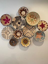 African Woven Baskets, Plates, And  Bowls Used As Wall Decor