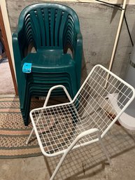 R14 Nine Outdoor Plastic Chairs And One Metal Mesh Outdoor Chair