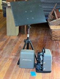 R5 Adjustable Music Stand And Bell & Howell Projector. Untested