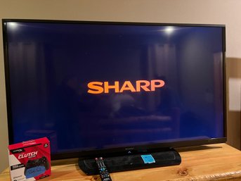R5 Sharp Aquos 60in Flat Screen TV.  Overall  54.5 X 32.    Hyper Wireless Gaming Controller