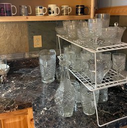 Incomplete Set Of Cut Glassware And Six Coffee Mugs