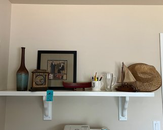 Wood Shelf 52in X 12in X 8in, Framed Art 16in X 16in, Straw Hat, Mantle Clock, Vase, Model Canoe, Model Boat