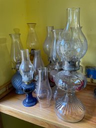 Collection Of Oil Lamps In Different Colors And Sizes