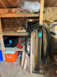 Lumber, Scrap Wood,  Shop Vac Hoses, Large Axe, Metal Open Tool Box With Trimmer String, Small Speakers