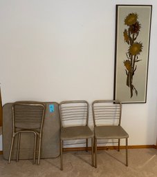 Sunflower Embroidered Art, A Folding Table And Four Folding Chairs