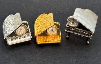 R5 Three Quartz Small Folding Piano Clocks Marked: Elgin, Timex, And One Unidentified